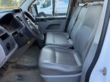 the interior of a white van with the door open