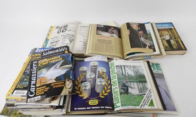 a lot of books and magazines on the table