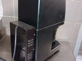 a microwave sitting on top of a counter in a kitchen