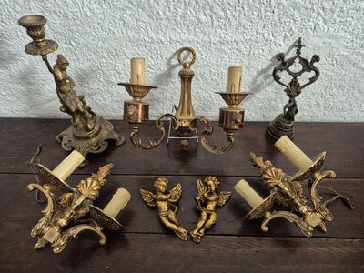 five candles that are sitting on a wooden table