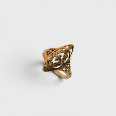 an image of a gold ring with a celtic design on it