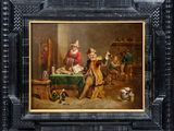 une peinture à l'huile représentant un groupe d'hommes jouant aux cartes dans une taverne