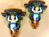 pair of wall sconces with cherenshes and leaves in blue and green