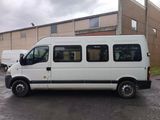 a white van that is parked in a parking lot
