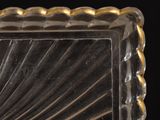 an image of a glass vase with a gold rim
