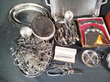 a lot of silver items that are on a table