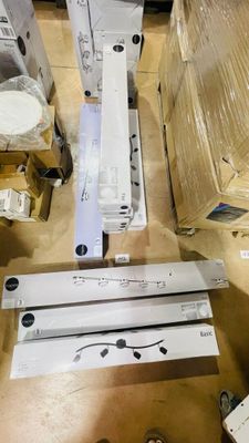many boxes of electronic equipment sitting on a table