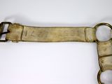 a close up of a belt on a white surface