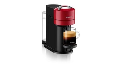 a red coffee maker sitting on top of a white surface