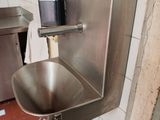 an image of a stainless steel sink in a kitchen