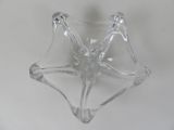 a clear glass vase with a flower inside of it