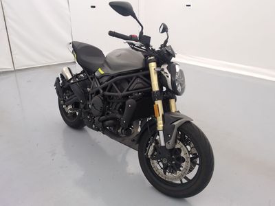 a picture of a motorcycle parked in a garage