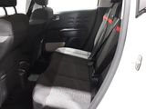 a picture of the inside of a car with the front seats down