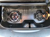 a close up of the inside of a car ' s trunk