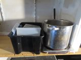 pots and pans are sitting on a shelf in a kitchen