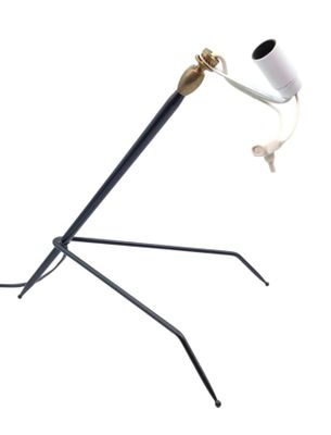 une image représentant une lampe posée sur un trépied