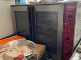 a microwave sitting on top of a counter next to a microwave oven