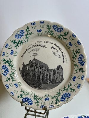 a plate that has a picture of a church on it