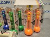 five different colored toothbrushes in the package