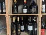 many bottles of wine on the shelves in the store