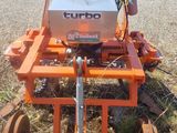 an image of a tractor with a plow attached to it