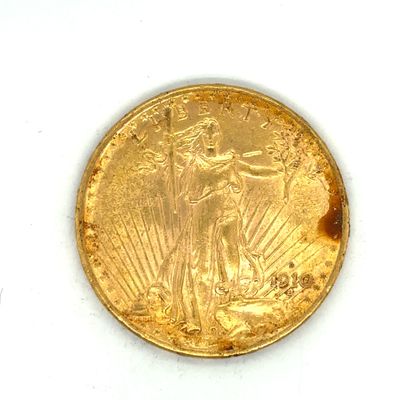 une image d'une pièce d'or sur une surface blanche