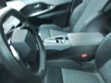 a steering wheel and dashboard of a car in a car