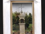 a picture of a white picture frame with a cross on it