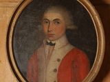 portrait d'un homme vêtu d'un manteau rouge et d'une chemise blanche