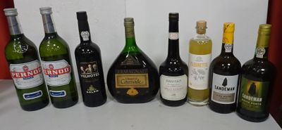 many bottles of wine lined up on a table