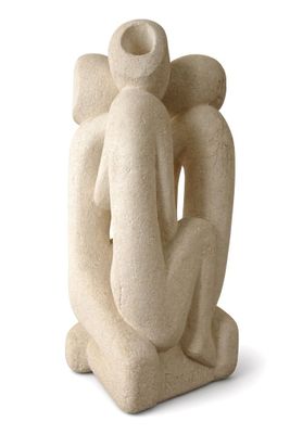 statue of a woman holding a child in her arms