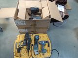 a box of tools sitting on the floor next to a box of tools