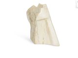 a white sculpture of a horse on a white background