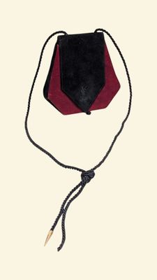 an image of a small purse with a string around it