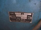 a sign on the side of a blue machine