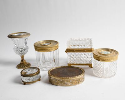 a lot of glass items that are sitting on a table