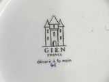 a close up of a plate with a castle on it