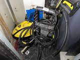 an image of a room with a bunch of tools on the floor