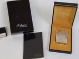 a box with a watch inside of it on a table