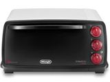 a close up of a black and white toaster oven on a white surface