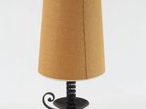 a lamp that is sitting on a table with a lamp on it