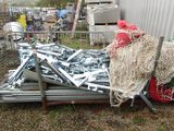 a pile of assorted metal items on the ground
