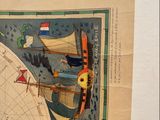 a picture of an old map hanging on a wall