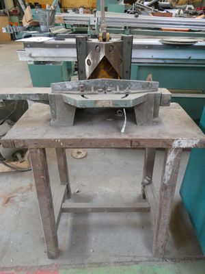 a machine that is sitting on a table in a factory