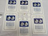 Six pièces de 25 cents des États-Unis sont présentées dans un coffret