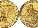 Gros plan sur une pièce d'or ornée d'un aigle