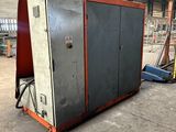 a large machine that is sitting in a warehouse