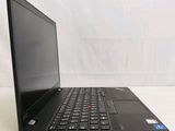 laptop computer sitting on a white surface with a white background