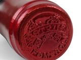 an image of a wine bottle stopper with a seal on it
