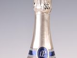 a bottle of champagne that is sitting on a table